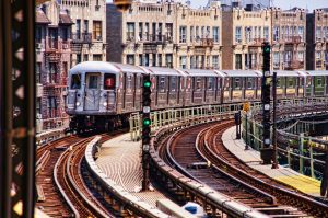 Using public transportation can lower New York living costs.