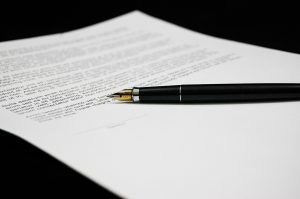 A pen on a document. 