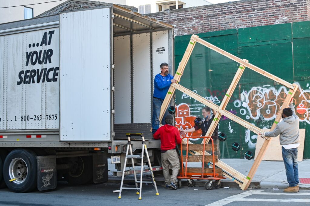 Professional movers loading a moving truck