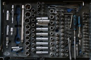 a wall of silver and blue metal tools, learn how to pack and move robust items