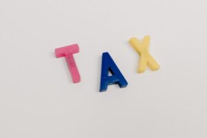 Colored letters that say TAX