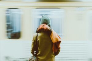 A woman waiting for a train